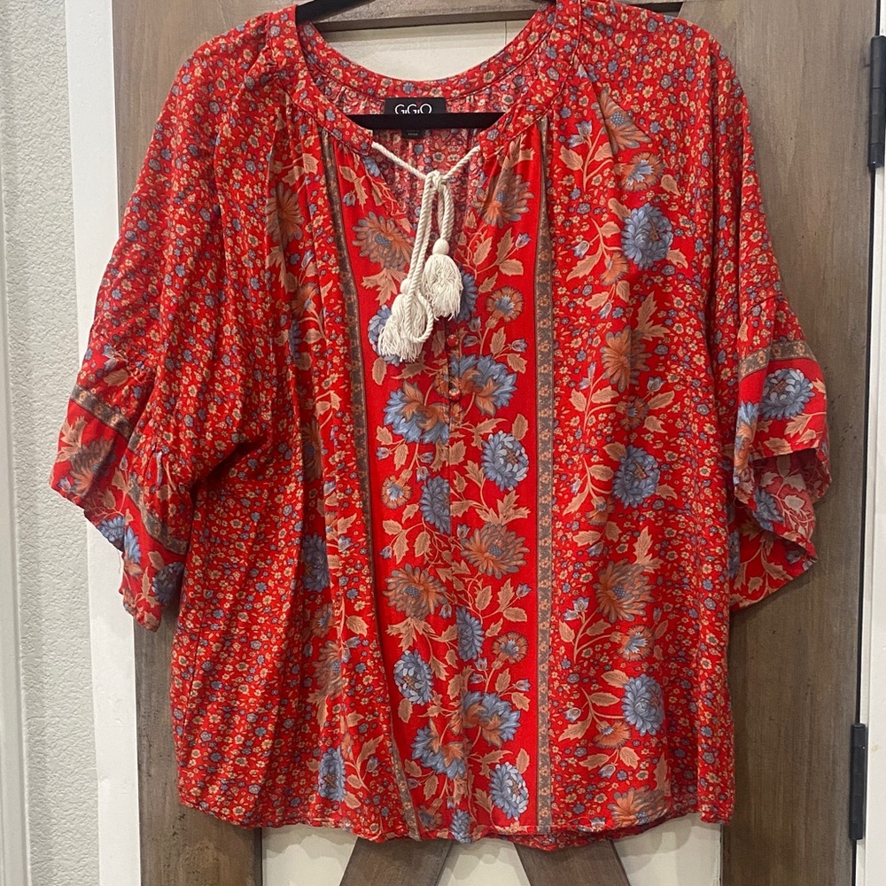 Vibrant Red Floral Blouse with Tassel Detail